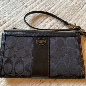 Coach Canvas wristlet.